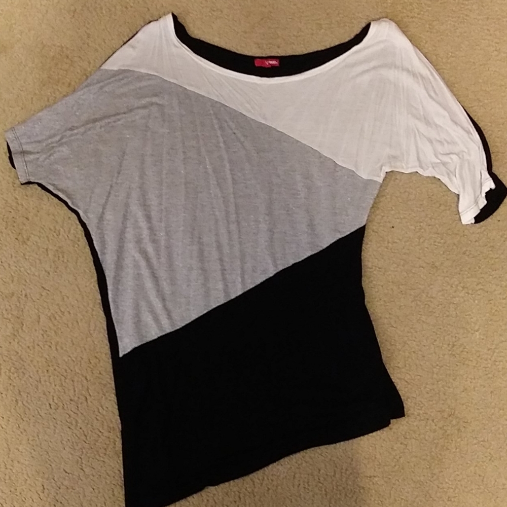 Off one shoulder shirt. Super cute on